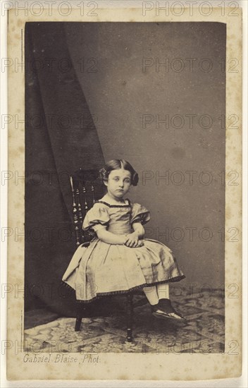 little girl with hair up on both sides, seated, with hands clasped; Gabriel Blaise, French, active Tours, France 1860s - 1870s