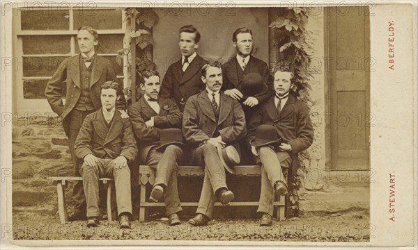 Group of seven  men: four seated, three standing, some holding hats; A. Stewart, British, active 1880s, about 1865; Albumen