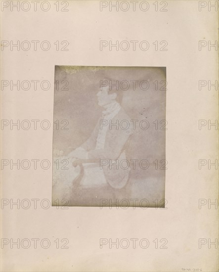 Profile portrait of a Seated Man in Feathered Cap; British, active India about 1843; India; 1843 - 1845; Salted paper print