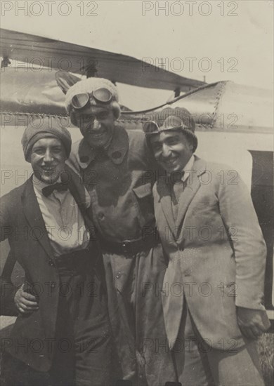 Portrait of three men smiling in front of an airplane; Fédèle Azari, Italian, 1895 - 1930, Italy; 1914 - 1929; Gelatin silver