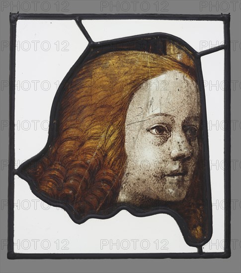 Head of an Angel from the Last Judgment; English; Gloucestershire, England; about 1510 - 1517; Colorless glass, vitreous paint