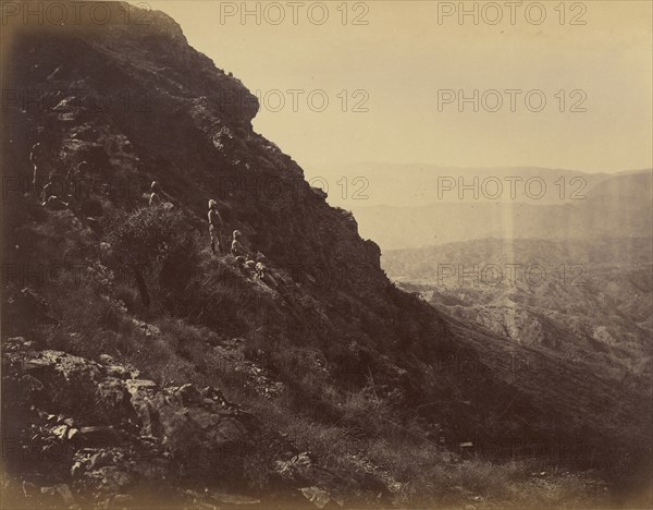 British soldiers resting on hillside; John Burke, British, active 1860s - 1870s, Afghanistan; 1878 - 1879; Albumen silver print