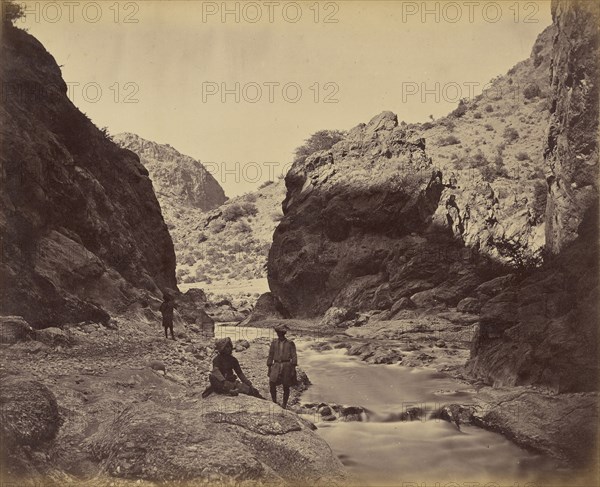 Three men beside river; John Burke, British, active 1860s - 1870s, Afghanistan; 1878 - 1879; Albumen silver print