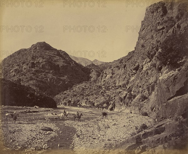 Two men on horseback near river; John Burke, British, active 1860s - 1870s, Afghanistan; 1878 - 1879; Albumen silver print