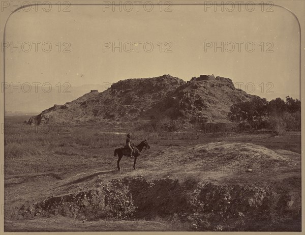 Lone rider in desert; John Burke, British, active 1860s - 1870s, Afghanistan; 1878 - 1879; Albumen silver print
