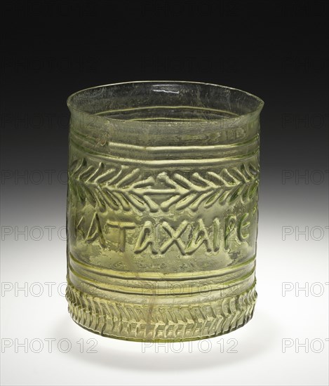 Green Cup with a Greek Inscription: Rejoice and be merry; Eastern Mediterranean; 1st century; Glass; 7.8 x 7.3 cm