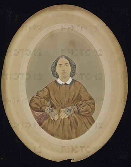 Portrait of a woman; American; about 1850 - 1860; Hand-colored salted paper print; 19 × 13.5 cm, 7 1,2 × 5 5,16 in