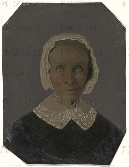 Portrait of woman in bonnet; United States; 1860s - 1880s; Hand-colored tintype; Sheet: 21.5 x 16.5 cm, 8 7,16 x 6 1,2 in