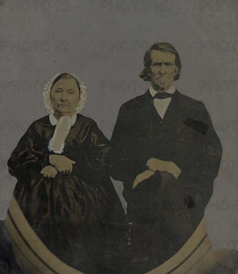Portrait of older man and woman; United States; 1860s - 1880s; Hand-colored tintype; Sheet: 25.7 x 20.1 cm, 10 1,8 x 7 15,16 in