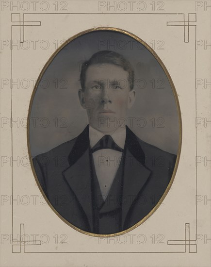 Portrait of young man; United States; 1860s - 1880s; Hand-colored tintype; Sheet: 21.5 x 16.6 cm, 8 7,16 x 6 9,16 in