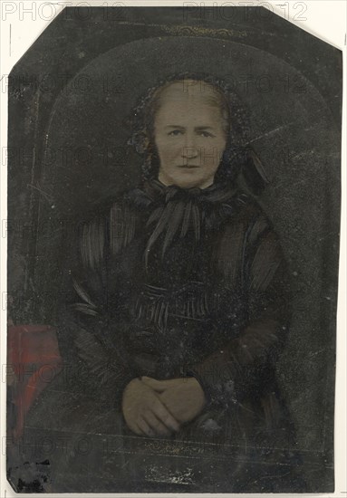 Portrait of woman in black bonnet; United States; 1860s - 1880s; Hand-colored tintype; Sheet: 25.5 x 17.2 cm, 10 1,16 x 6 3,4 in
