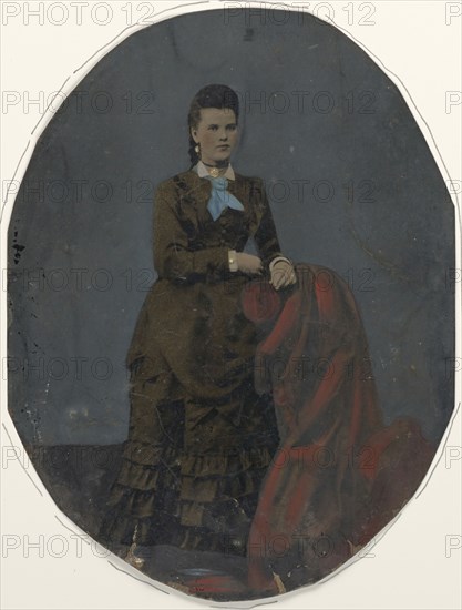 Portrait of young woman; United States; 1860s - 1880s; Hand-colored tintype; Sheet: 21.2 × 16.2 cm, 8 3,8 × 6 3,8 in