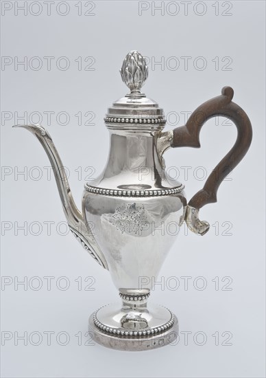 Silver jug with wooden handle with reversed pear-shaped body, with family crest, long narrow decorated spout and bud