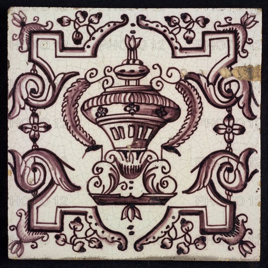 Tile, purple on white, vase with round floral ornaments, framed by régence decoration, wall tile tile sculpture ceramic