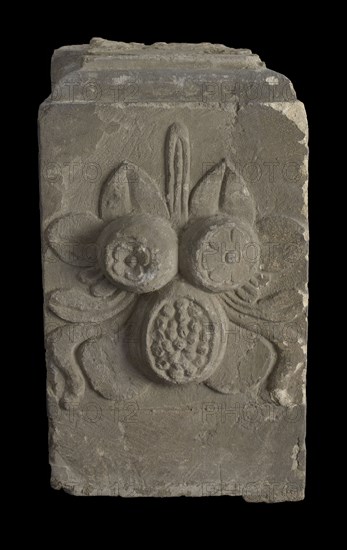 Basement with fruits and leaves, part of chimney, basement pilaster ornament building component sandstone stone, sculpted