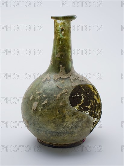 Bulky (medicine?) Bottle, bottle holder bottomfound glass, free blown and shaped Bolbuikig (medicine?) Bottle in clear light