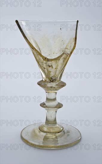 Fragment of foot, trunk and part of calyx of chalice, wine glass drinking glass drinking utensils tableware holder soil find