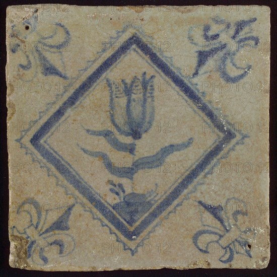 Tile, tulip on ground in blue on white, inside serrated square, corner pattern french lily, wall tile tile sculpture ceramic