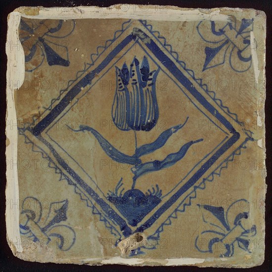 Tile, tulip on ground in blue on white, inside serrated square, corner pattern french lily, wall tile tile sculpture ceramic