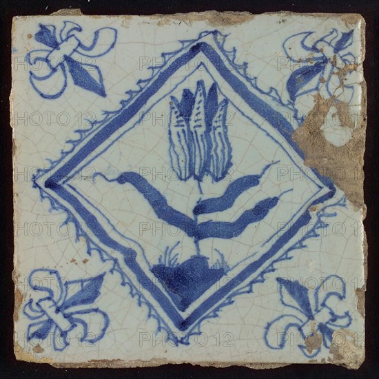 Tile, tulip on ground within serrated squared, in blue on white, corner pattern french lily, wall tile tile sculpture ceramics