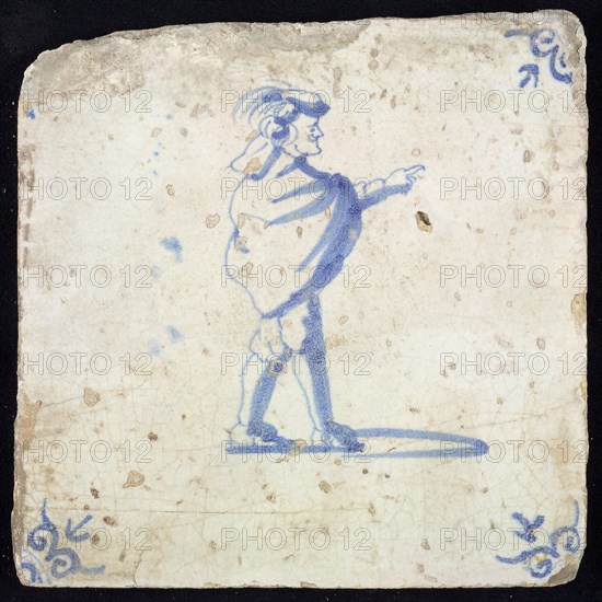 Figure tile, blue with pointing nobleman 'and profile', corner motif ox's head, wall tile tile sculpture ceramic earthenware