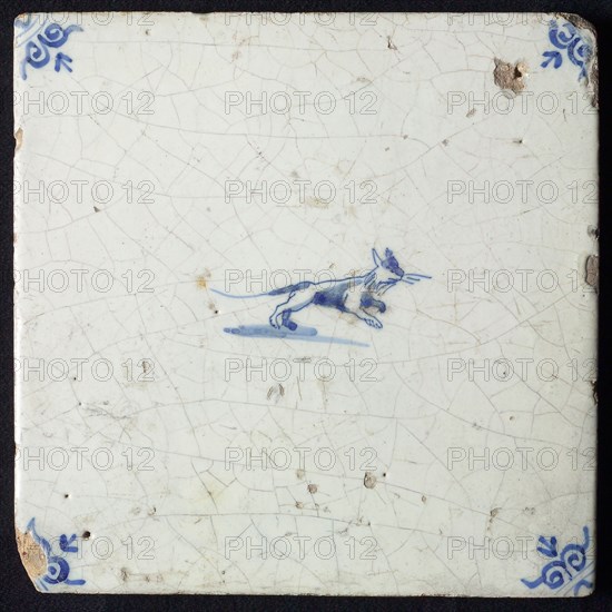 Animal tile, jumping cat to the right, in blue on white, corner motif; ox head, wall tile tile sculpture ceramic earthenware