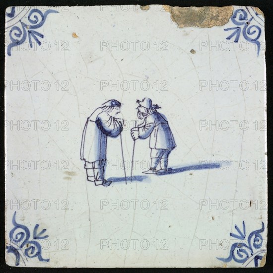 Figure tile, blue with two with old men with sticks in conversation, corner motif ox's head, wall tile tile sculpture ceramic