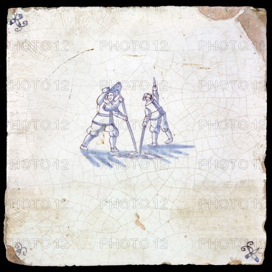 Figure tile, blue with two with men sticking with sticks in the ground, corner motif spider, wall tile tile sculpture ceramic