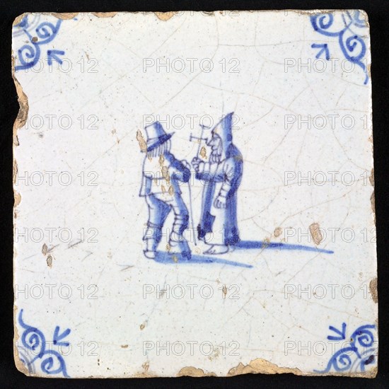 Figure tile, blue with man with stick and monk with cross, corner motif ox's head, wall tile tile sculpture ceramic earthenware