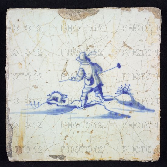 Figure tile, blue with shepherd with staff in landscape with boar, no corner motif, wall tile tile sculpture ceramic earthenware