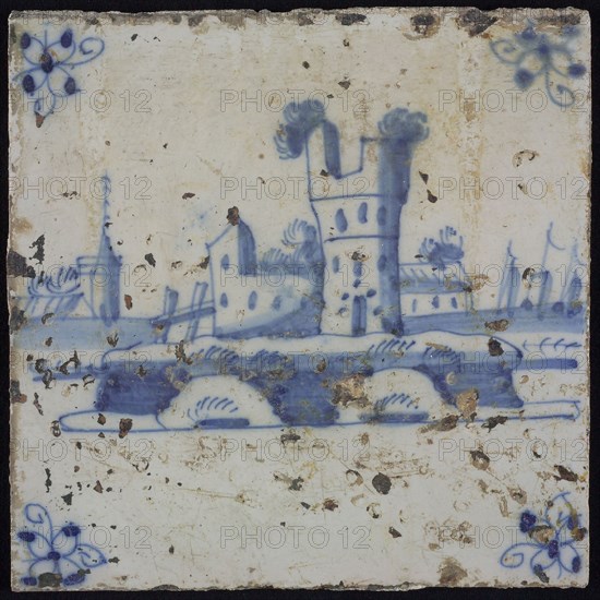 Scene tile, blue with landscape with castle ruin, corner motif spider, wall tile tile sculpture ceramic earthenware glaze, baked