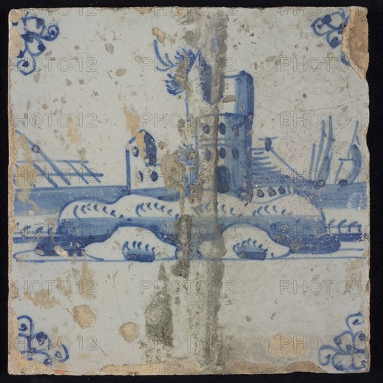 Scene tile, blue with landscape with castle ruin, corner motif spider, wall tile tile sculpture ceramic earthenware glaze, baked