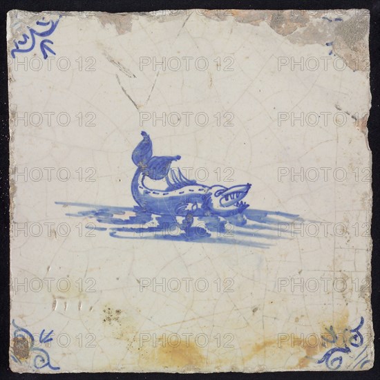 Animal tile, sea-based in water to the right, in blue on white, corner motif of ox-head, wall tile tile sculpture ceramic