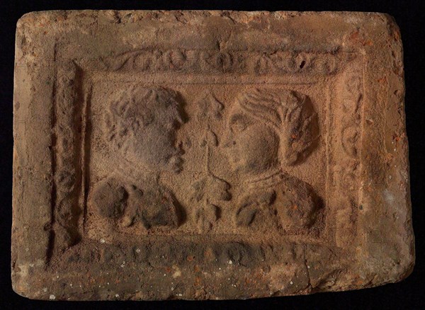 Hearthstone, Luiks, from Luik, Liege Belgium, with wide frame, with male and female head, hearth fireplace component ceramics