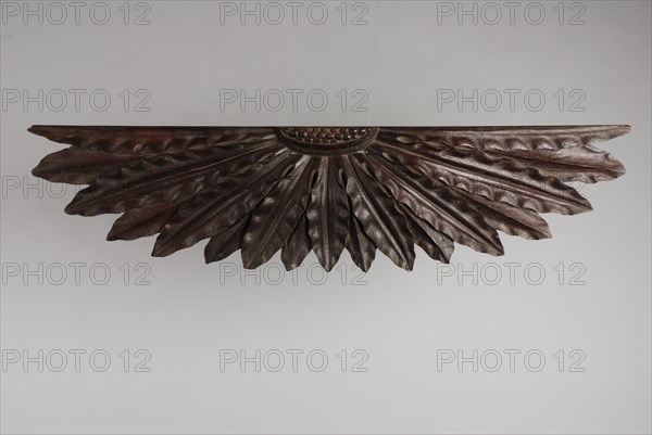 Carved wooden ornament consisting of elongated leaves in fan shape, ornament wood carving sculpture footage wood