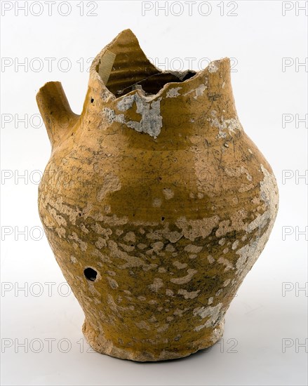 Glued fragment of yellow jug with remnant of standing ear, water jug be tableware holder earth discovery ceramics earthenware