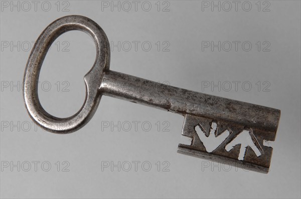Iron key with heart-shaped eye, hollow key handle and cruciform beards in beard, key iron iron, hand forged Key with heart