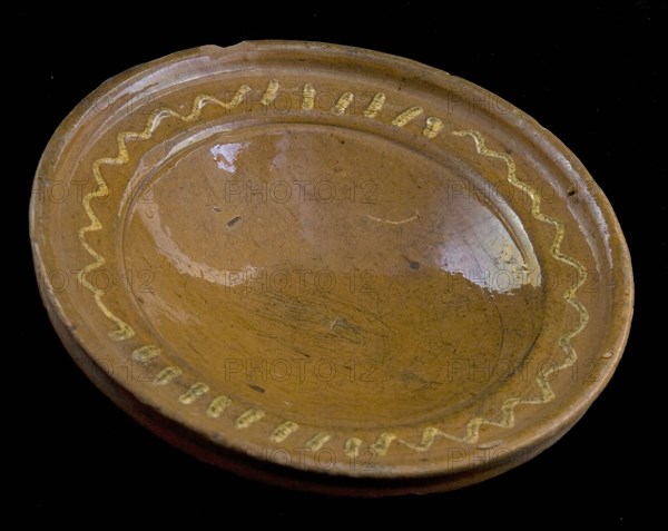 Red earthenware plate or dish with white mud decoration along the edge, stand ring, plate dish crockery holder soil find ceramic