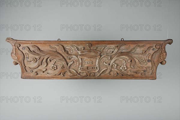Wooden ornament with coat of arms and floral motifs, part of car, ornament part wood carving sculpture sculpture wood metal iron
