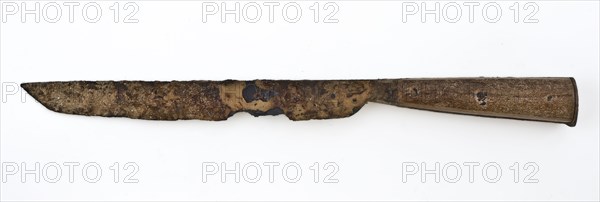 Knife with elongated iron blade and wooden handle, consisting of two plates, knife cutlery soil find iron wood metal, archeology