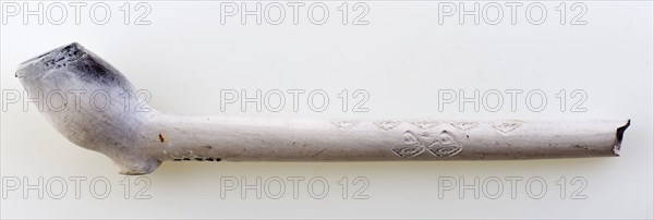 Clay pipe, marked, decorated with fleur de lis stamps, clay pipe smoking equipment smoke floor pottery ceramics pottery, pressed
