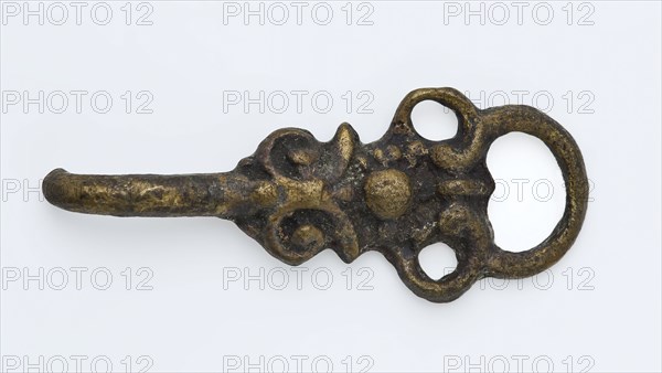 Coat hook or coat closure with floral decoration, round eye and bent end as hook, closure clothing accessory clothing soil find