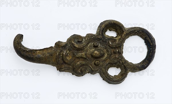 Coat hook or coat closure with ornamental decoration, round eye and bent end as hook, closure clothing accessory clothing soil