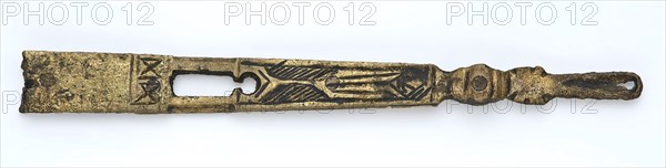 Brass tongue, long and narrow, ending in an oval eye, engraved decoration, fitting belt accessory soil find copper brass metal