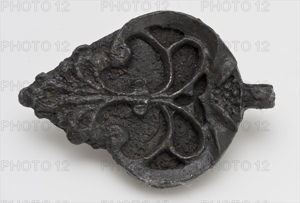 Heart-shaped pendant or ornament with floral ornament in relief, with eye, hanger batter clothing accessory clothing soil find