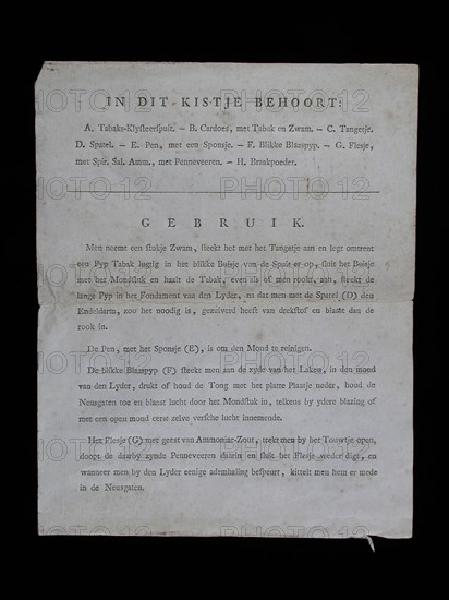 Sheet of paper BELOW THIS BOX, printed with inventory and instructions for use of tobacco sprayer for drowning persons, manual