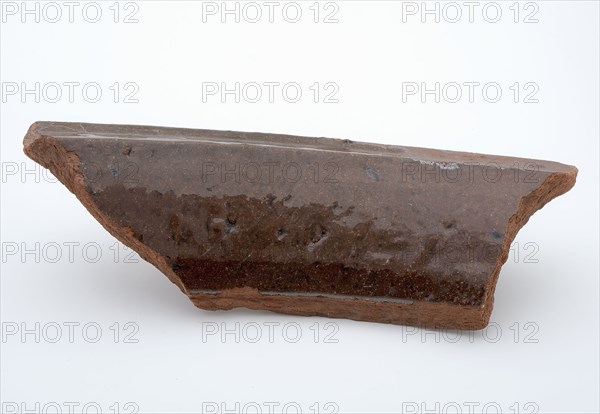 Fragment of red earthenware, partly glazed, fragment crockery holder kitchen utensils earthenware ceramics earthenware glaze