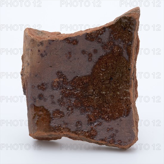 Fragment of red earthenware, partly glazed, fragment crockery holder kitchen utensils earthenware ceramics earthenware glaze