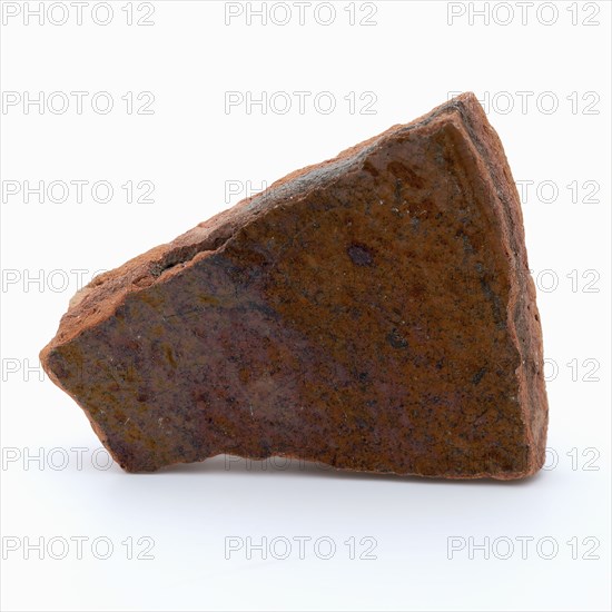 Fragment of red earthenware, partly glazed, fragment crockery holder kitchen utensils earthenware ceramics earthenware glaze