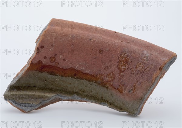 Fragment of red earthenware, partly glazed, fragment crockery holder kitchen utensils earthenware ceramics earthenware glaze